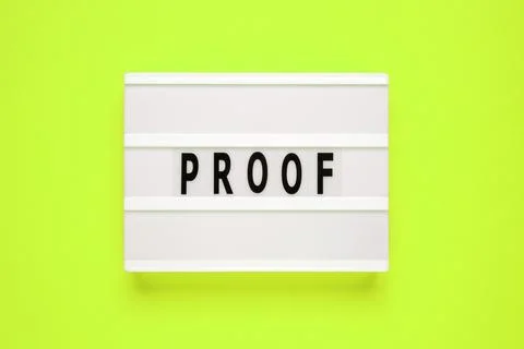 Lightbox with word proof on green background. Business Concept image. Stock Photos
