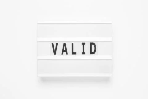 Lightbox with word valid on white background Stock Photos