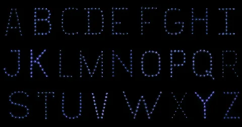 Lightbulb Alphabet. In focus. Flickering. Stock Footage 35316154