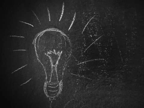 Lightbulb on a Blackboard Stock Illustration
