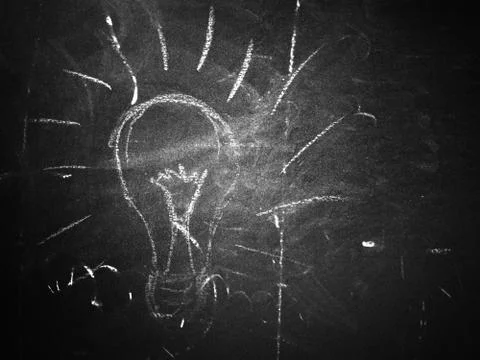 Lightbulb on a Blackboard Stock Illustration