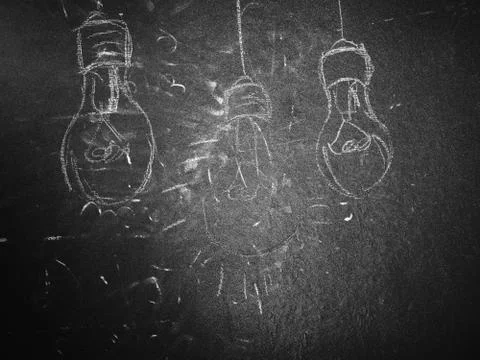 Lightbulb on a Blackboard Stock Illustration