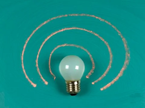 Lightbulb on chalkboard Stock Photos