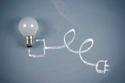 Lightbulb on chalkboard Stock Photos