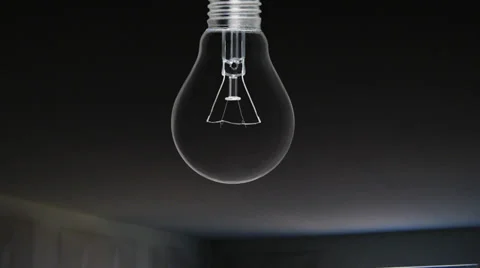 Lightbulb energy animation on black background with glowing planet earth inside Stock Footage 32964762