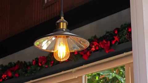 Lightbulb hang inside the cafe. Stock Footage 310344318