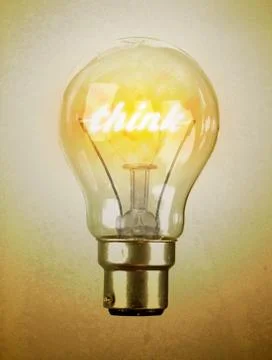 Lightbulb with the word think Stock Photos