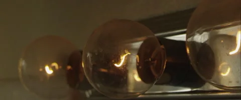 Lightbulbs turning on and off in slow motion Stock Footage 47182296