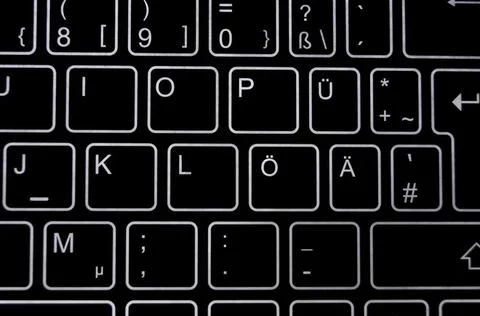 Lighted up black computer keyboard Stock Photos