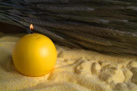 Lighted candle and flour Stock Photos