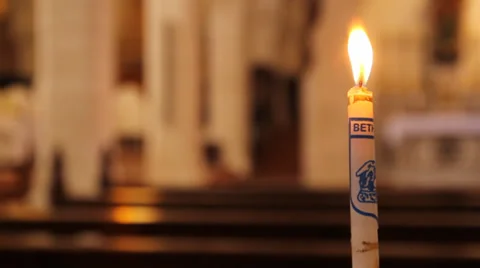 Lighted candle in church Stock Footage 32152600