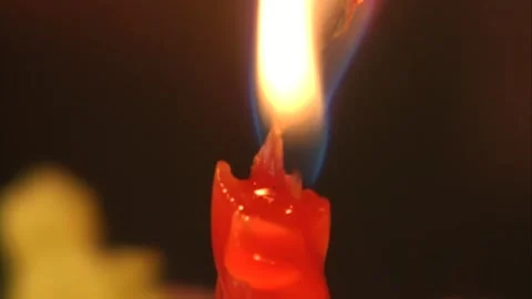 Lighted candle close-up Stock Footage 253772359