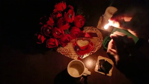 Lighted a candle for a romantic evening Stock Footage 84865030