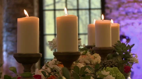 Lighted candles and flowers on window background Stock Footage 44021628