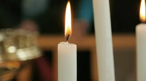 Lighted candles in cathedral Stock Footage 10893701