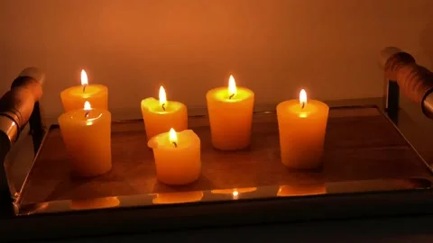 Lighted candles Stock Footage 136869061