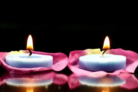 Lighted candles Stock Photos