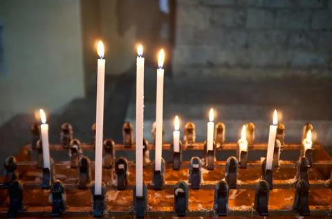 Lighted candles Stock Photos