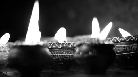 Lighted clay candle diya with selective focus and shallow depth of field in t Stock Footage 108740223