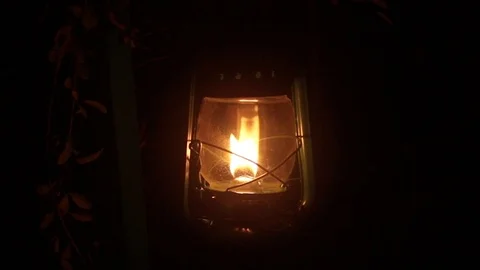 Lighted kerosene lamp at night Stock Footage 113860089