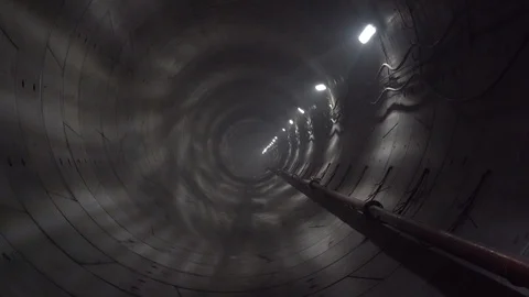 Lighted underground tunnel at the construction stage Stock Footage 90231931