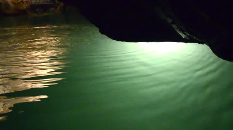 Lighted water in cave system in czech republic Stock Footage 40023846