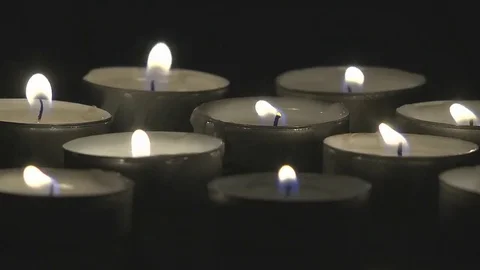 Lighted Wax Candles Stock Footage 75798076