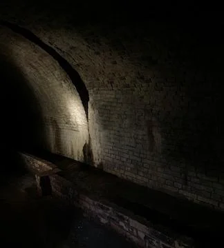 Lightened wall inside the cave Stock Photos