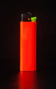 Lighter on black background Stock Photos