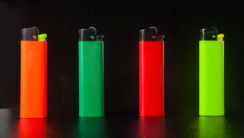 Lighter on black background Stock Photos