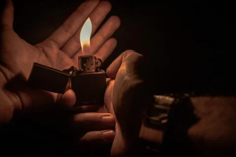 Lighter at night Stock Photos