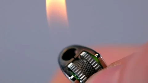 Lighter Slowly Burning Stock Footage 233878446