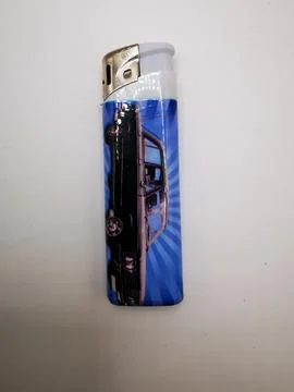 Lighter on a white background. Stock Photos