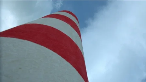 LightHouse 1Red and white chimney with blue sky very low shot Stock Footage 86294614