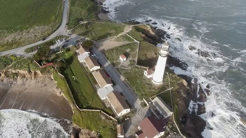 Lighthouse from above on the west coast Stock Footage 89889782