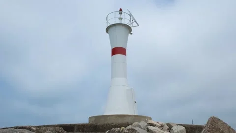 Lighthouse and clouds Stock Footage 240133858