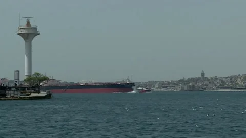 Lighthouse and large ship Video stock 147022125