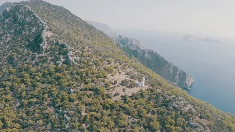 Lighthouse and mountain Stock Footage 138793373