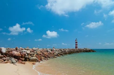 Lighthouse and the ocean Stock Photos