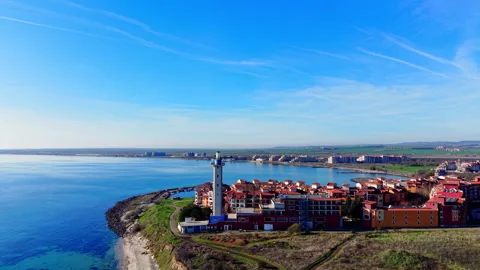 Lighthouse and residential complex on Black Sea coast aerial view Stock Footage 334313080