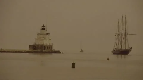 Lighthouse and Schooner, in Sepia 库存影片 11250671