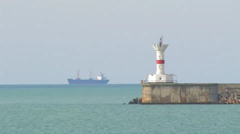 Lighthouse and ship. Stock Footage 27079363