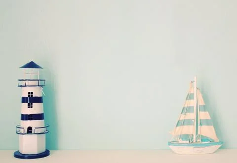 Lighthouse and ship model for decorated in room with retro filter effect Stock-Fotos