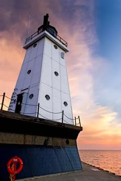 Lighthouse and Sunset Sky Stock Photos