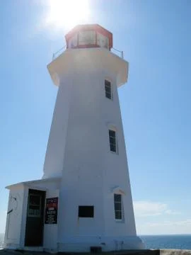 Lighthouse in backlight Stock Photos