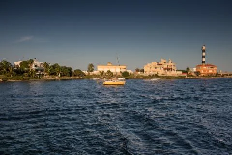Lighthouse in the bay Stock Photos