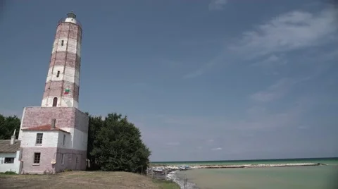 Lighthouse at the Beach 4K Stock Footage 66562212
