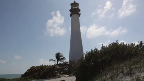 Lighthouse on the Beach and Flags on the Beach Video stock 83967617