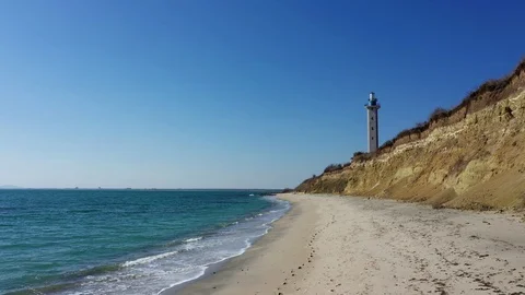 Lighthouse on the beach 스톡 동영상 103865827