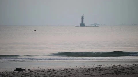 Lighthouse on the beach, lighthouse on the ocean  Stock Footage 310919809